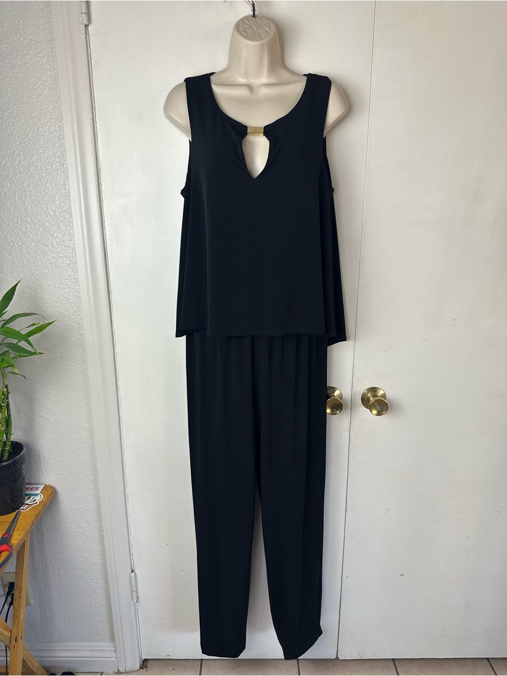 London Times Black Sleeveless Jumpsuit with Gold Accent